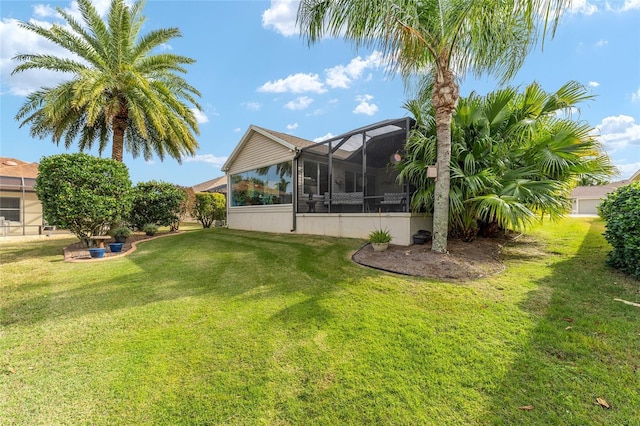 view of yard with a lanai