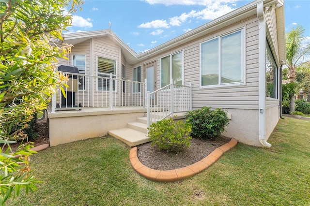 exterior space featuring a front lawn