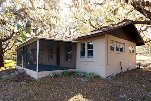 exterior space with a sunroom