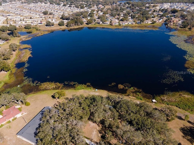 bird's eye view with a water view