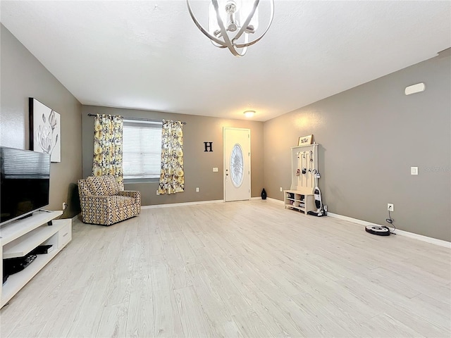 living area with light hardwood / wood-style flooring