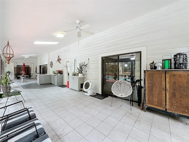 interior space featuring a ceiling fan