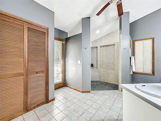 1701 Cedar Stone Ct, Lake Mary, FL 32746 - bathroom with a closet, a stall shower, tile patterned floors, vaulted ceiling, and vanity