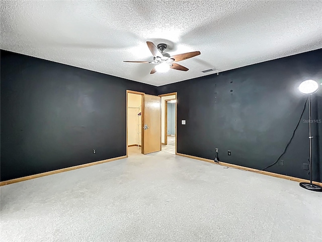 1701 Cedar Stone Ct, Lake Mary, FL 32746 - unfurnished room featuring a ceiling fan, a textured ceiling, and baseboards