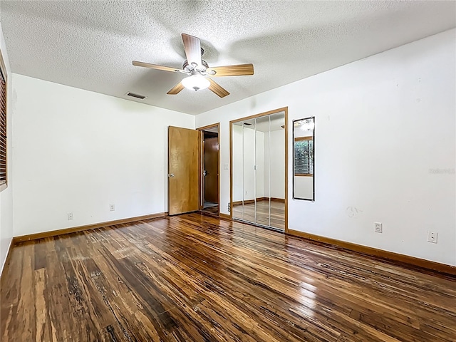 1701 Cedar Stone Ct, Lake Mary, FL 32746 - unfurnished bedroom with hardwood / wood-style floors, baseboards, a textured ceiling, a closet, and ceiling fan