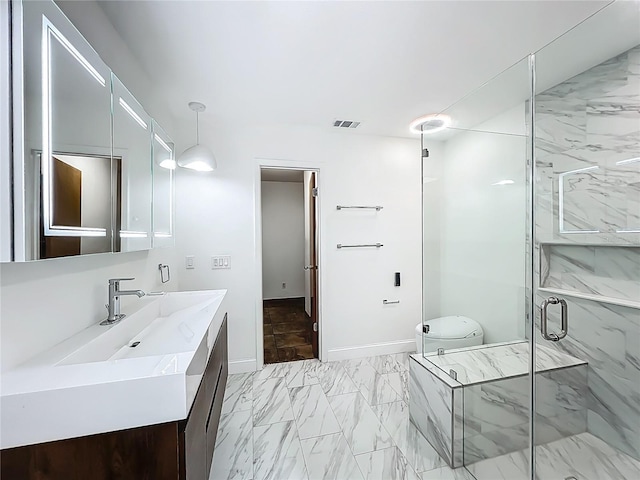 1701 Cedar Stone Ct, Lake Mary, FL 32746 - full bath with marble look tiles, vanity, a marble finish shower, baseboards, and toilet