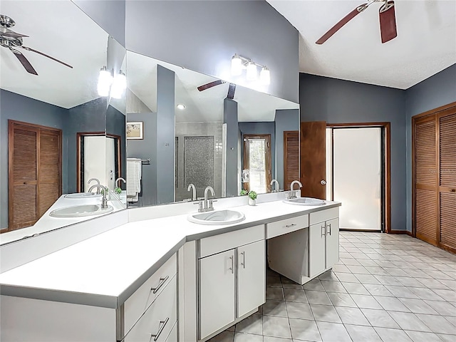 1701 Cedar Stone Ct, Lake Mary, FL 32746 - bathroom with a ceiling fan, a closet, double vanity, and a stall shower