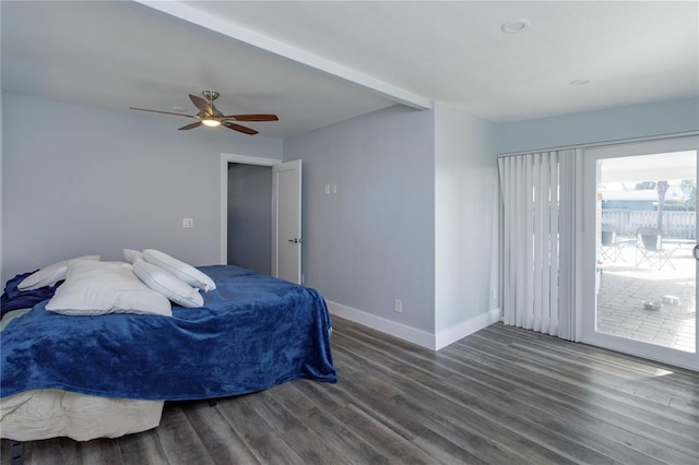 bedroom featuring ceiling fan and dark wood-type flooring