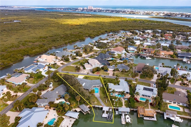 aerial view featuring a water view