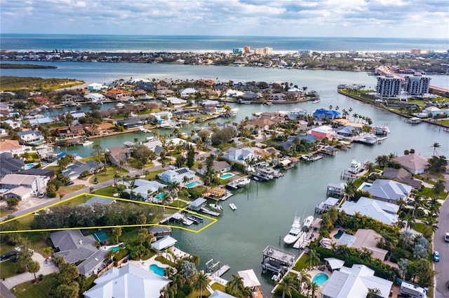 drone / aerial view with a water view