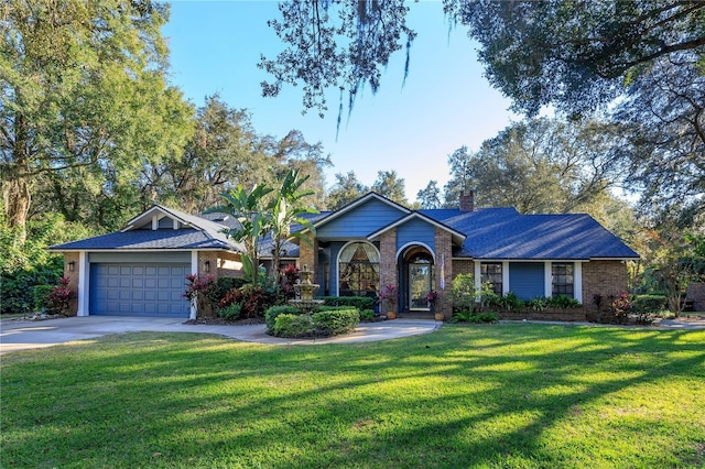 single story home featuring a front yard and a garage