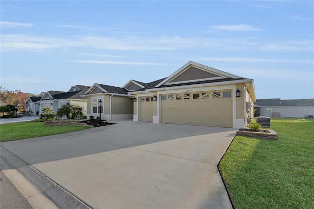 single story home featuring a garage and a front yard