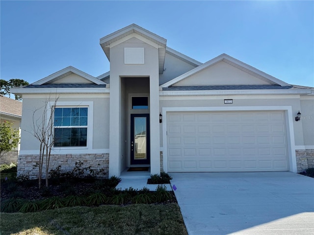 view of front of home with a garage