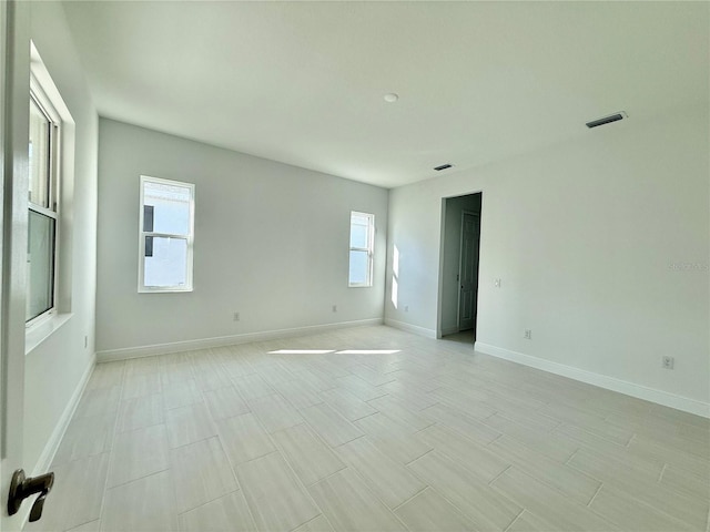 2022 Wallingford Loop, Mount Dora, FL 32757 - unfurnished room featuring baseboards