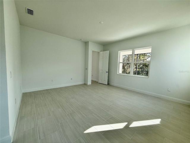 2022 Wallingford Loop, Mount Dora, FL 32757 - unfurnished room with baseboards
