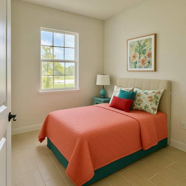 2022 Wallingford Loop, Mount Dora, FL 32757 - tiled bedroom featuring baseboards