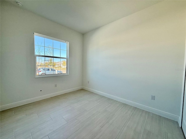 2022 Wallingford Loop, Mount Dora, FL 32757 - spare room featuring baseboards