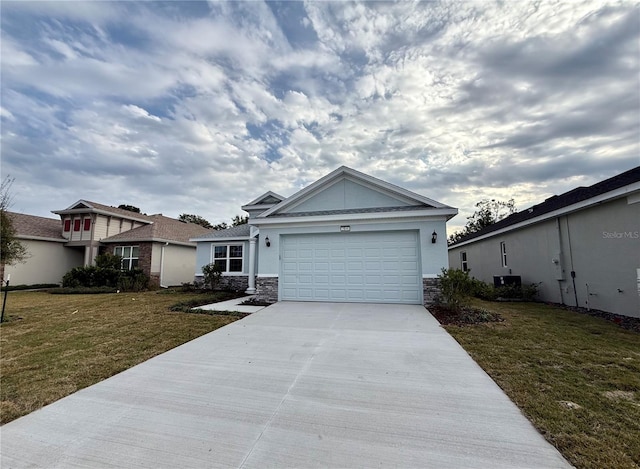 ranch-style house with a front lawn and a garage