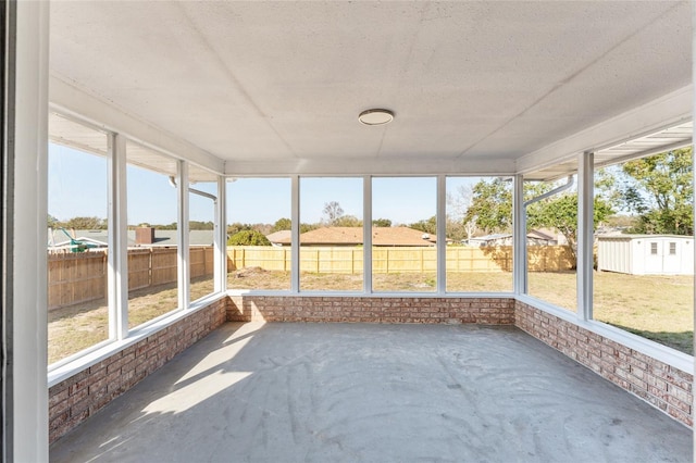 unfurnished sunroom with a healthy amount of sunlight