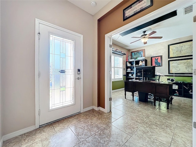 entrance foyer featuring ceiling fan