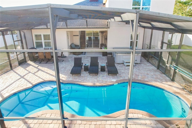 view of swimming pool featuring a patio area