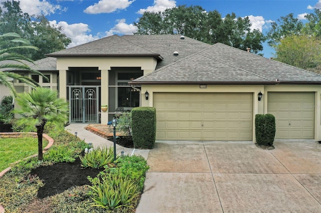 view of front of property with a garage