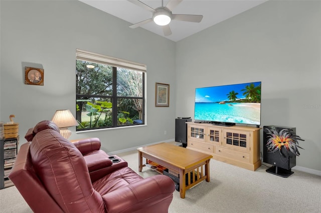 living room featuring carpet flooring and ceiling fan