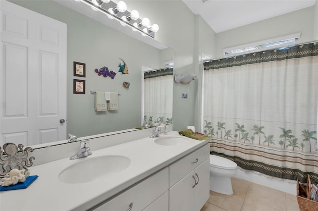 bathroom featuring tile patterned flooring, vanity, toilet, and a shower with shower curtain