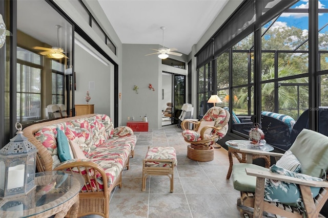 sunroom with ceiling fan and lofted ceiling