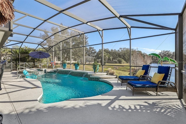 view of pool featuring pool water feature, a patio area, and glass enclosure