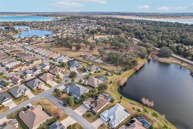 drone / aerial view with a water view