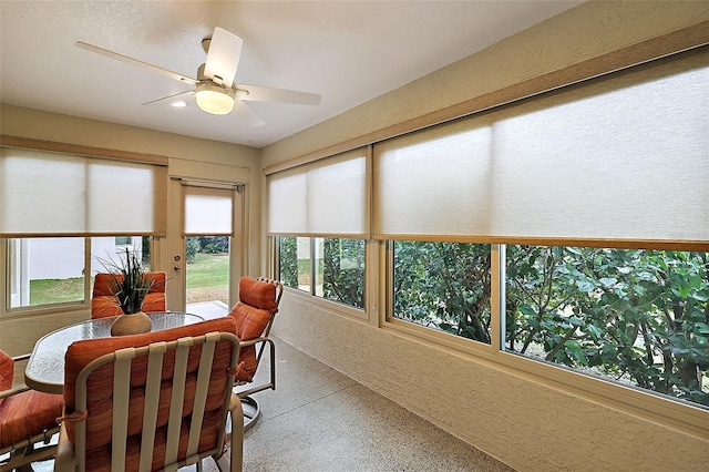 sunroom / solarium with ceiling fan