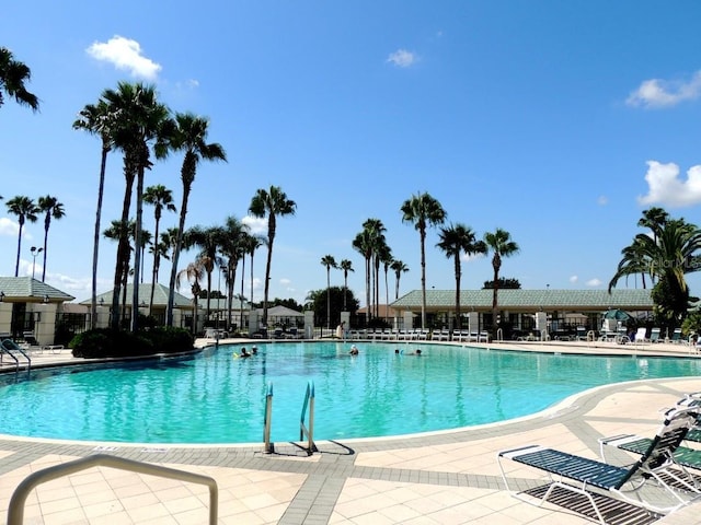 view of swimming pool featuring a patio area