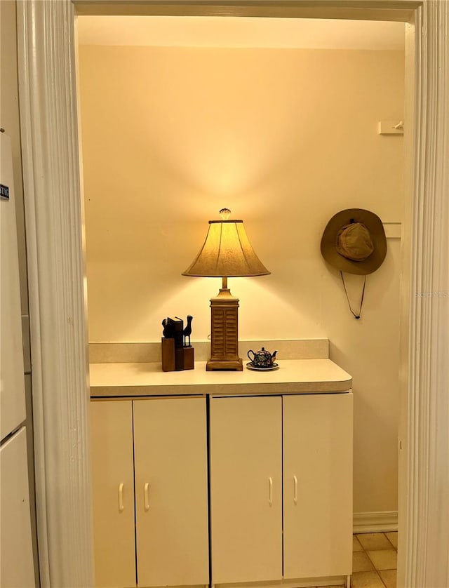 interior details featuring white refrigerator