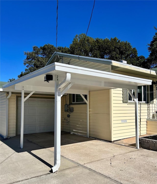 garage with a carport