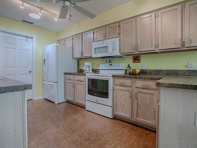 kitchen featuring light brown cabinets, white appliances, rail lighting, and ceiling fan