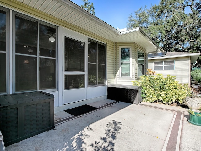 entrance to property featuring a patio area