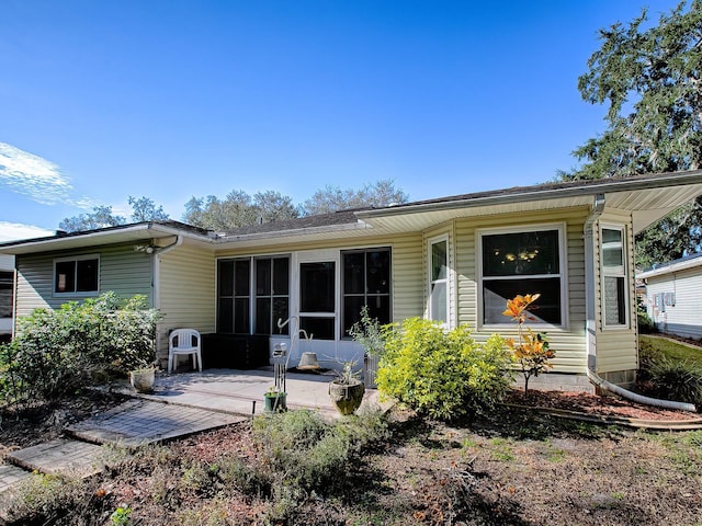 back of house featuring a patio