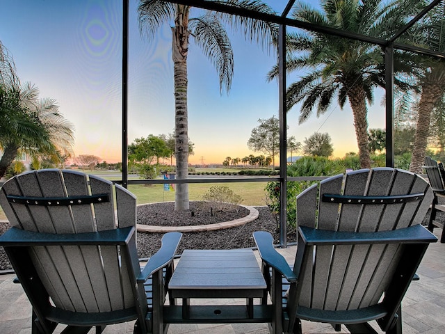 view of patio terrace at dusk