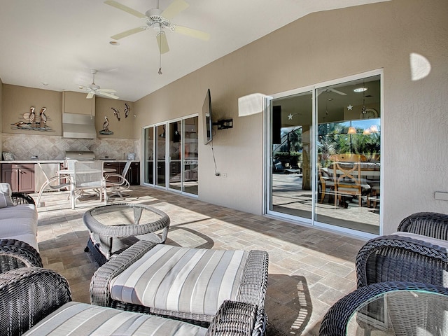 view of patio featuring ceiling fan