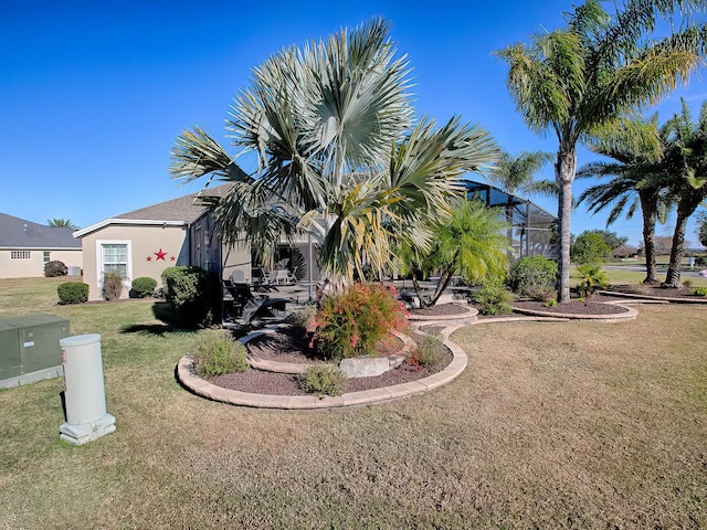 view of yard with a lanai