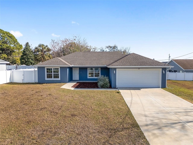 single story home featuring a garage and a front lawn