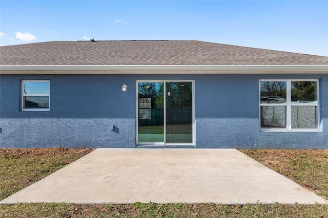 back of house with a patio area