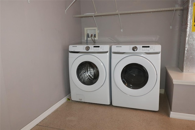 laundry room with separate washer and dryer