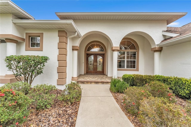 entrance to property featuring french doors