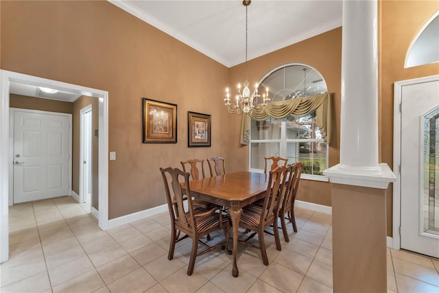 dining room featuring decorative columns, ornamental molding, a chandelier, and light tile patterned flooring