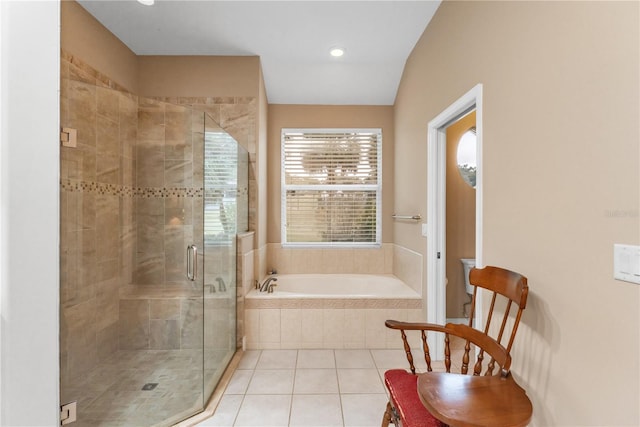 bathroom featuring separate shower and tub and tile patterned floors