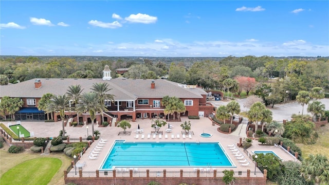 view of swimming pool featuring a patio area