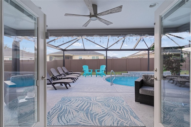 view of pool featuring a lanai and a patio area