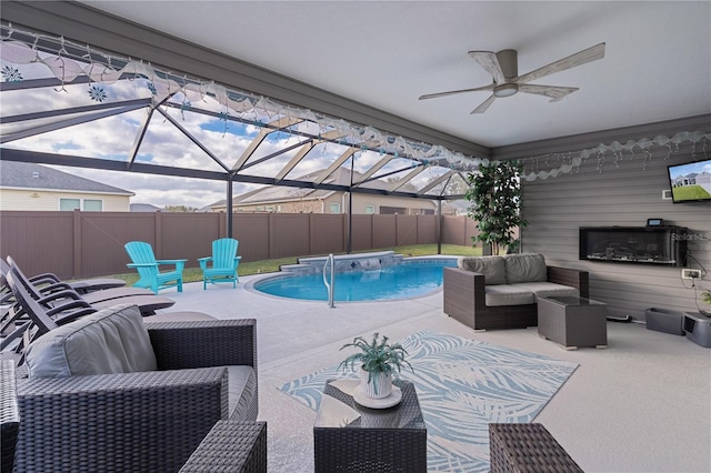 view of swimming pool with a patio, pool water feature, an outdoor hangout area, and ceiling fan